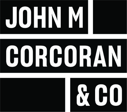 John M. Corcoran & Co. - Development & Property Management logo