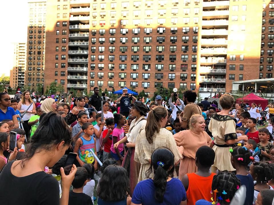 Children enjoying LeFrak City's Shakespeare in the Park