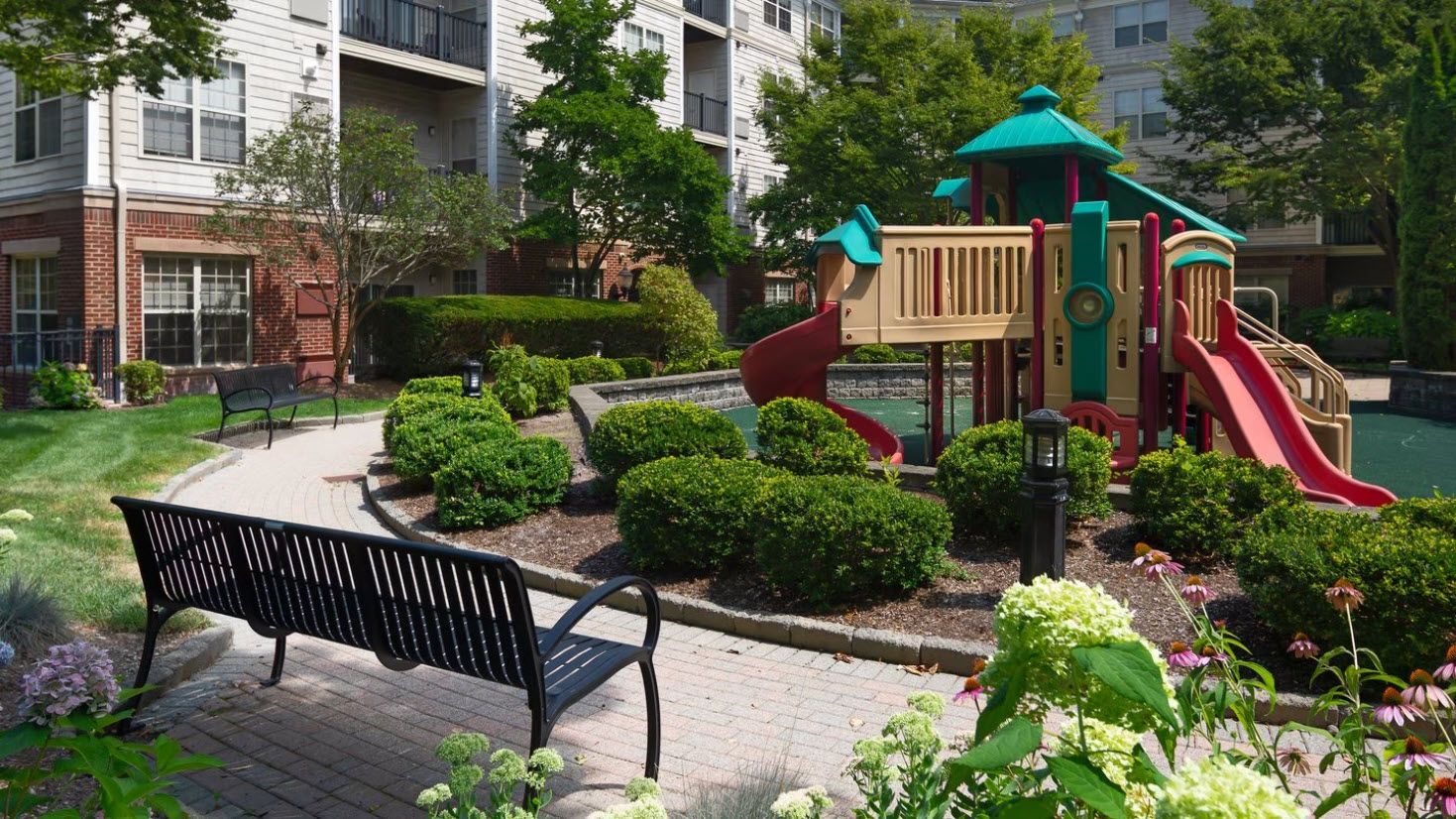 Playground with benches and green landscapes