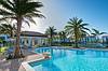 Swimming pool with lounge seating and covered area