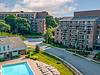 Faxon commons tens apartment building and pool with leasing center