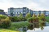 Exterior view of Millside at Heritage Park buildings and pond