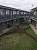 courtyard of two story apartment complex