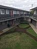 courtyard of two story apartment complex