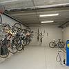 bicycles hanging on wall racks