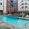 Pool Courtyard with swimming pool, grilling stations and lots of seating.