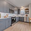 Apartment kitchen with stainless steel appliances