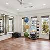 Spacious gym area with yoga balls, kettlebells, yoga mats, and foam roller at Lantower Edgewater
