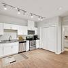 Spacious kitchen with hardwood floors, accessible cabinets and stainless steel appliances in Lantower Edgewater