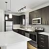 kitchen with brushed nickel fixtures and a kitchen island
