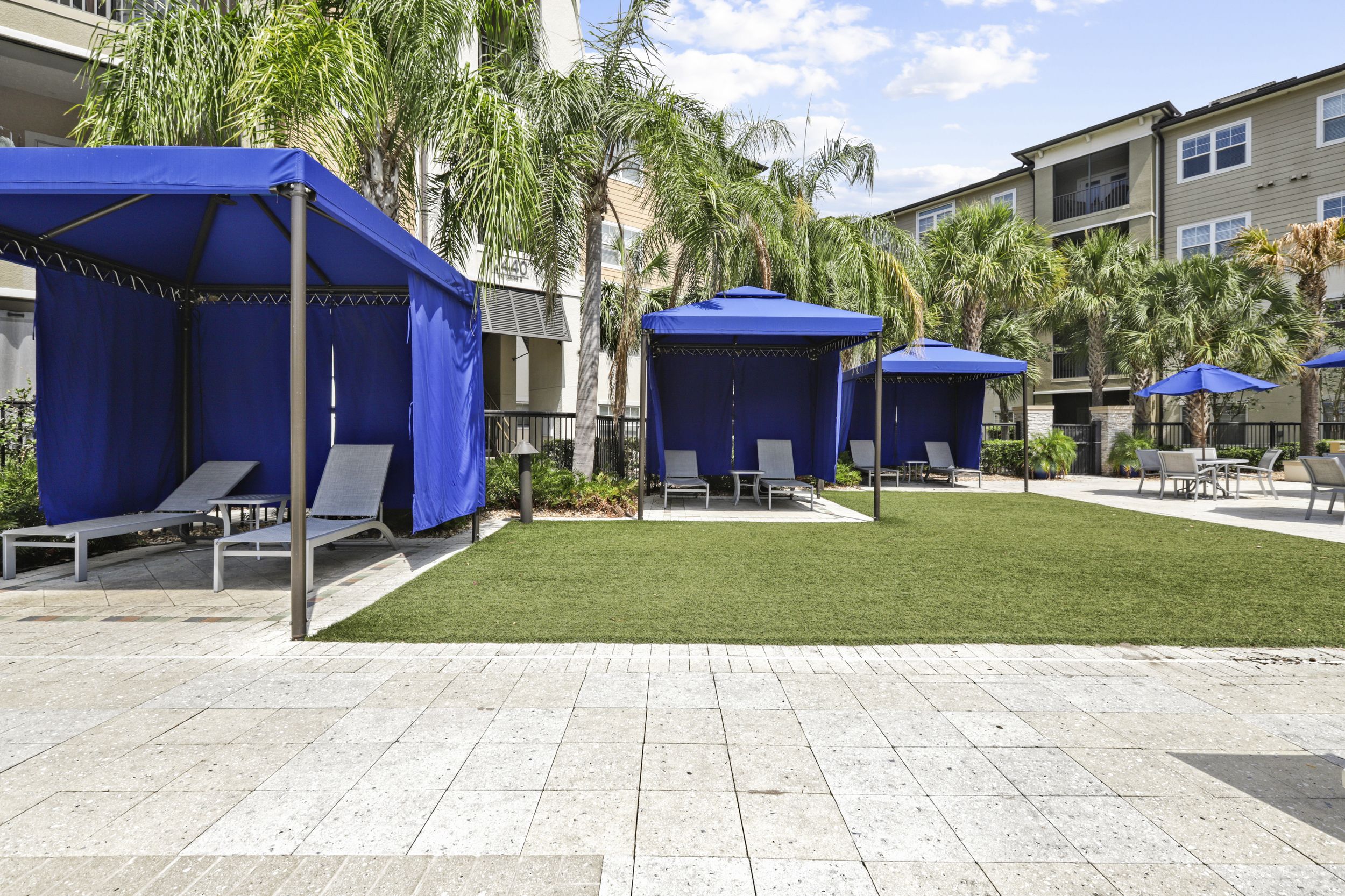 Poolside Cabanas with Summer Kitchen and Hammock Hang Out at Lantower Brandon Crossroads Apartments.