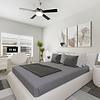 Spacious, carpeted bedroom with a ceiling fan, two large windows with ample natural light, modern, cream furniture with grey accents and grey wall art at Lantower Brandon Crossroads.  