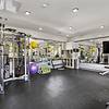 Spacious and clean 24-hour gym with weights and fitness machines at Lantower Brandon Crossroads Apartments.