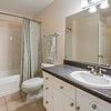 Bathroom with granite countertops and shower/tub
