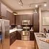 Kitchen with stainless steel appliances and granite countertops