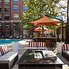 fireplace and seating by the pool