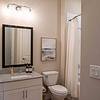 Bathroom with ample storage and tub/shower combination