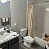 Apartment bathroom with large bathtub