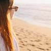 Woman with sunglasses on beach