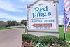 entry signage for Red Pines Apartment Homes