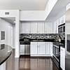 Kitchen with white cabinetry 