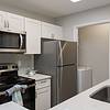 Apartment kitchen with stainless steel appliances