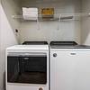 Washer and dryer with wire shelf on top