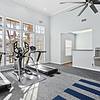 Fitness center with cardio equipment and fan