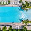 Heated saltwater swimming pool An aerial view of a swimming pool in Monarc Apartments