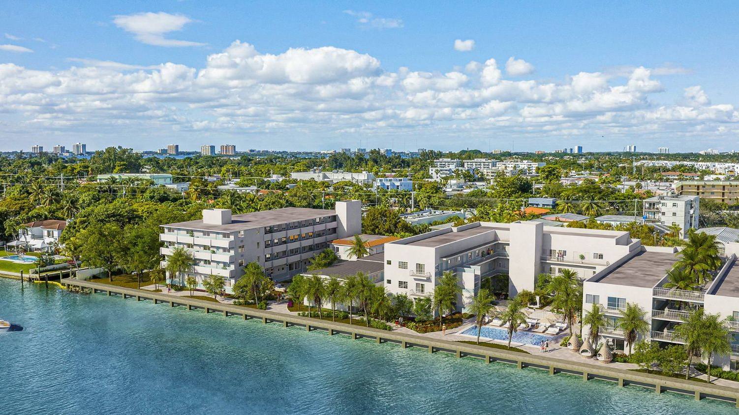 elevated view of row of apartment buildings near bay