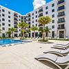 Luxurious pool courtyard at Villa Solé at SoLé Mia Apartments in North Miami