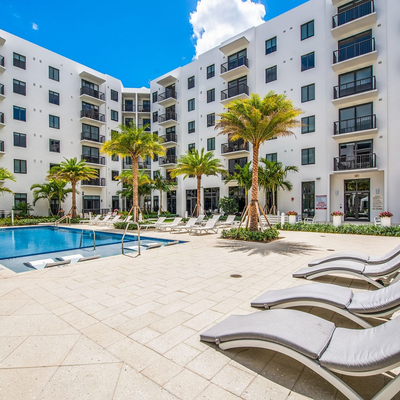 Swimming Pools Luxurious pool courtyard at Villa Solé at SoLé Mia Apartments in North Miami