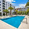 Luxurious pool courtyard at Villa Solé at SoLé Mia Apartments in North Miami
