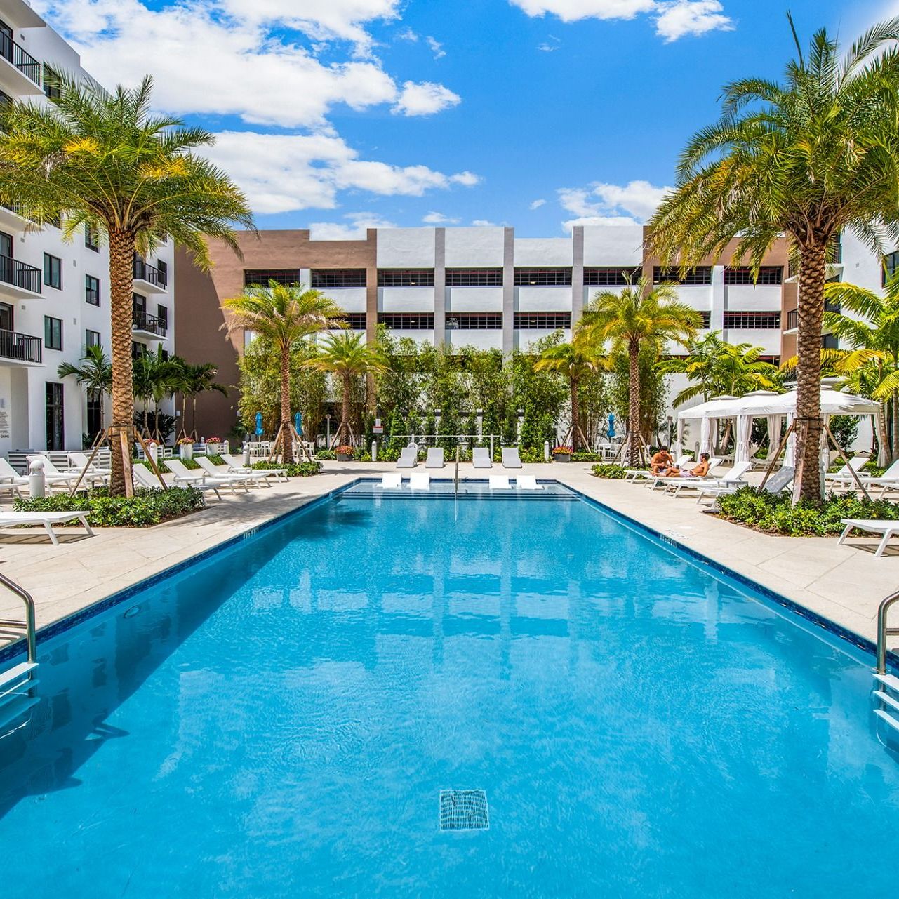 Swimming Pools Luxurious pool courtyard at Villa Solé at SoLé Mia Apartments in North Miami