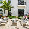 Firepit with seating at Villa Solé at SoLé Mia Apartments in North Miami