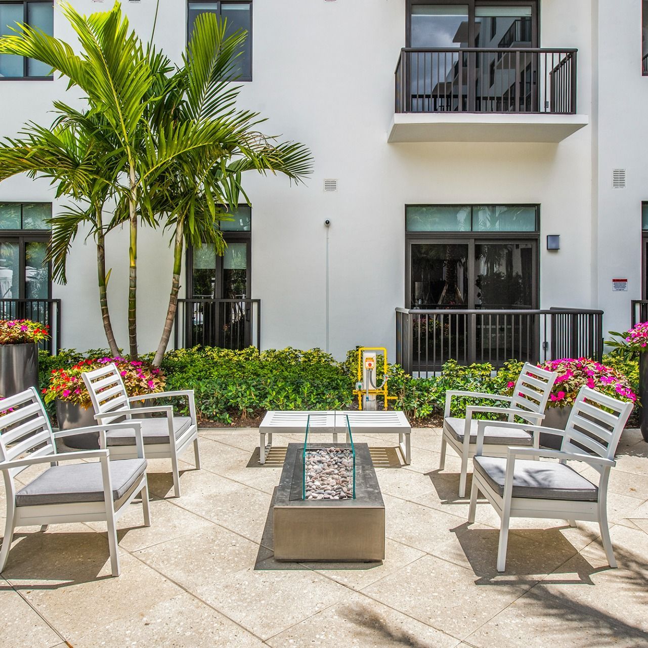 Swimming Pools Firepit with seating at Villa Solé at SoLé Mia Apartments in North Miami