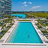 Elevated pool deck overlooking Laguna SoLé at The Shoreline at Solé Mia Apartments in North Miami