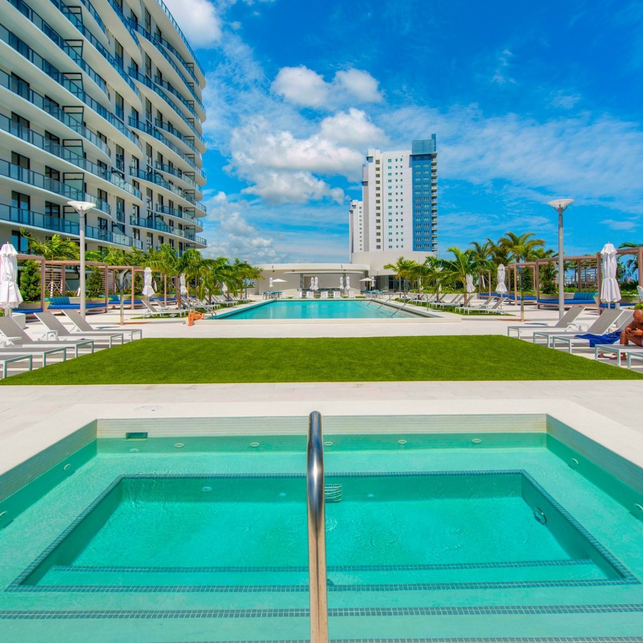 Swimming Pools Luxurious pool deck overlooking Laguna Solé at The Shoreline at Solé Mia Apartments in North Miami
