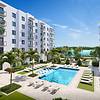 Luxury pool deck overlooking Laguna SoLé at Villa Laguna at Solé Mia Apartments in North Miami
