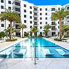 Luxurious pool courtyard at Villa Solé at SoLé Mia Apartments in North Miami