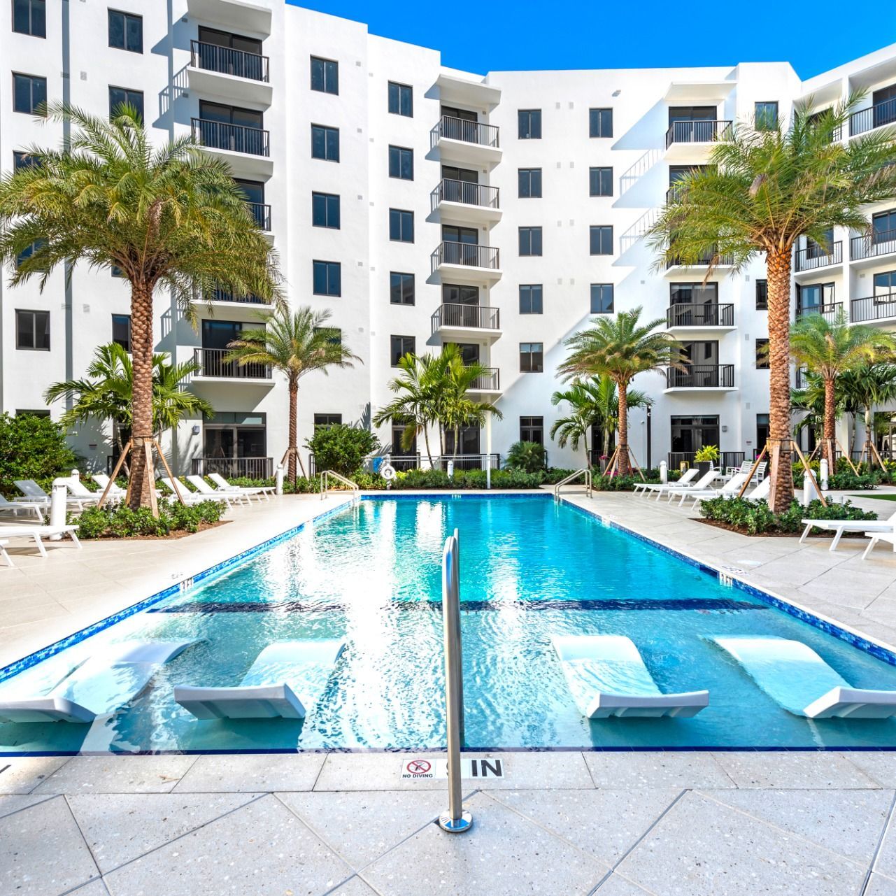 Swimming Pools Luxurious pool courtyard at Villa Solé at SoLé Mia Apartments in North Miami