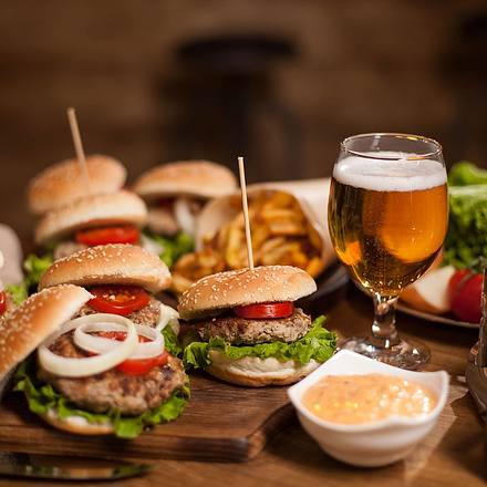 burger sliders and beer on table