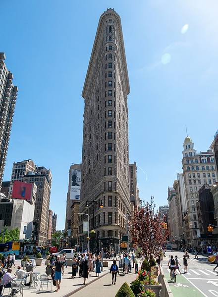 street level photo of the flatiron building and district